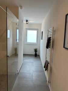 Koupelna v ubytování Ostwall Terrassen Apartment 5.29 + 13 fotografií