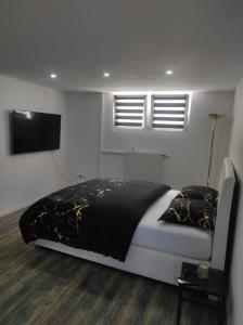 Katil atau katil-katil dalam bilik di Studio 45m2 très calme