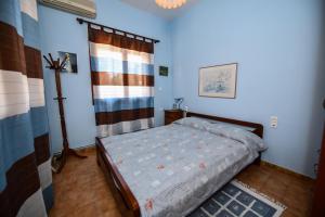 Postel nebo postele na pokoji v ubytování Villa Koliri