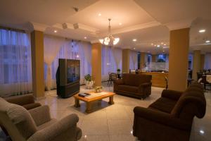TV a/nebo společenská místnost v ubytování Grande Hotel Guarapuava