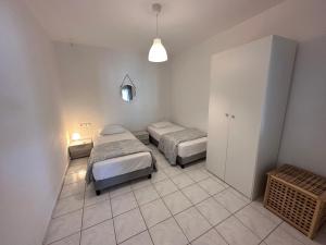 Postel nebo postele na pokoji v ubytování Revel Mykonos 6