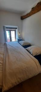 Posteľ alebo postele v izbe v ubytovaní Chambres d'hôtes Domaine La Touche