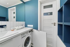 Koupelna v ubytování Kotlarska Market Square Apartment with Airconditioning by Noclegi Renters