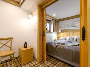 Posteľ alebo postele v izbe v ubytovaní VisitZakopane - Willa Bajka Apartments