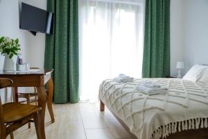 Cama o camas de una habitación en Cudne Manowce