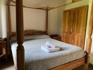 Postel nebo postele na pokoji v ubytování Can Clotas Hotel Masia