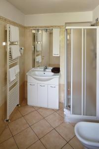 Ett badrum på Residence Cavour 63