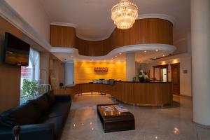 The lobby or reception area at Grande Hotel Guarapuava