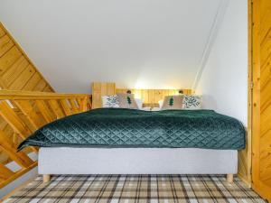 Posteľ alebo postele v izbe v ubytovaní VisitZakopane - Willa Bajka Apartments
