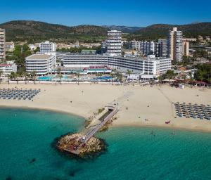 an aerial view of a beach and the ocean at INNSiDE by Meliá Wave Calviá in Magaluf