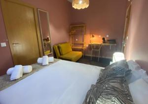 Tempat tidur dalam kamar di Porto Santo Destination