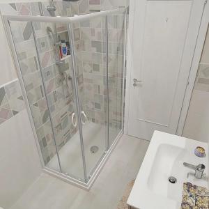 a bathroom with a shower and a sink at Best Residence **** in Termoli
