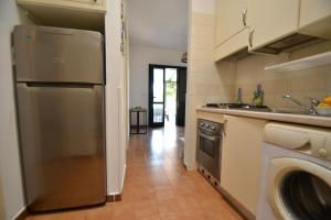 Køkken eller tekøkken på Villetta Gianira per 5 ospiti-pt58