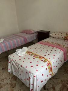 Postel nebo postele na pokoji v ubytování 15 minuti dal mare