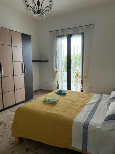 Postel nebo postele na pokoji v ubytování 15 minuti dal mare