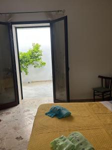 Postel nebo postele na pokoji v ubytování 15 minuti dal mare