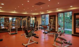 a gym with several treadmills and elliptical machines at Kimeros Park Holiday Village - Ultra All Inc. Kids Concept in Kemer