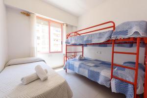 Posteľ alebo postele v izbe v ubytovaní Apartamentos Nuevo México C 451