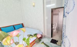 Postel nebo postele na pokoji v ubytování DaLat Sky Hostel