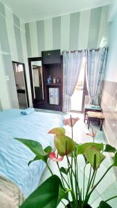 Postel nebo postele na pokoji v ubytování DaLat Sky Hostel