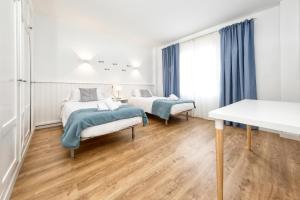 Posteľ alebo postele v izbe v ubytovaní Ocean front Oasis
