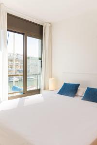 Кровать или кровати в номере Pierre & Vacances Empuriabrava Marina
