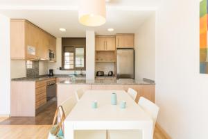 Кухня или мини-кухня в Pierre & Vacances Empuriabrava Marina
