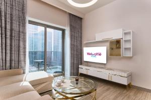 TV a/nebo společenská místnost v ubytování Wonderful 1BR in a luxury home! MBL Residence