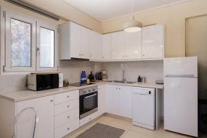 A kitchen or kitchenette at Luxury Villa Perla