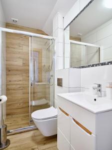 Koupelna v ubytování Villa Łeba Pokoje & Apartamenty