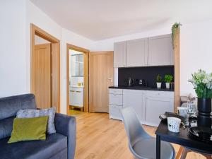 Kuchyň nebo kuchyňský kout v ubytování Villa Łeba Pokoje & Apartamenty