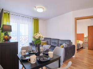 Posezení v ubytování Villa Łeba Pokoje & Apartamenty