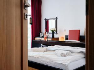 Postel nebo postele na pokoji v ubytování Villa Łeba Pokoje & Apartamenty