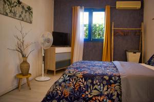 Postel nebo postele na pokoji v ubytování Casa Babalahy