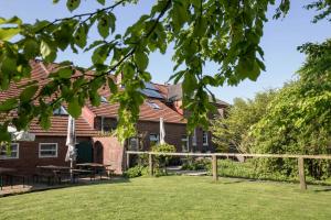 a view of the rear of the house from the lawn at Wattlodge in Norden