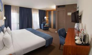Postel nebo postele na pokoji v ubytování Best Western Plus Congress Hotel Yerevan