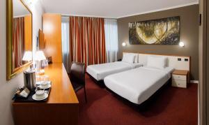 Postel nebo postele na pokoji v ubytování Best Western Plus Congress Hotel Yerevan