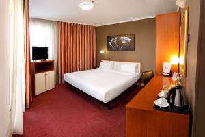 Postel nebo postele na pokoji v ubytování Best Western Plus Congress Hotel Yerevan