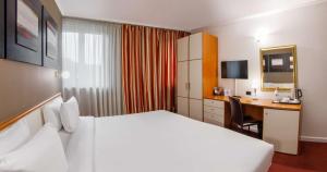 Postel nebo postele na pokoji v ubytování Best Western Plus Congress Hotel Yerevan