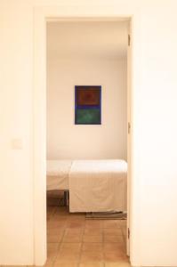 Giường trong phòng chung tại Vida na Aldeia