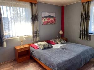 Postel nebo postele na pokoji v ubytování Hotel zum Ziehbrunnen