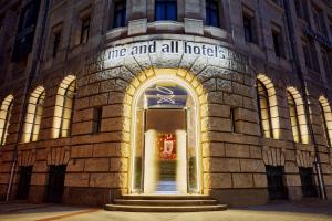 a building with a sign on the front of it at me and all hotel Hanover, part of JdV by Hyatt in Hannover