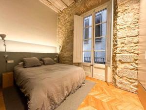 Tempat tidur dalam kamar di Bell Lloc Girona High end design apartment