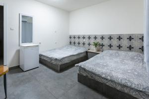 Little Prince Hostel-5 Min Walk To The Beach客房内的一张或多张床位