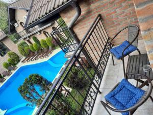 an image of a balcony with a swimming pool at Apartman Aleksa in Bela Crkva