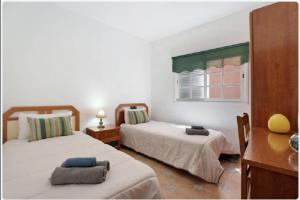 Posteľ alebo postele v izbe v ubytovaní Casa María - Finca Medina