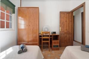 Posteľ alebo postele v izbe v ubytovaní Casa María - Finca Medina