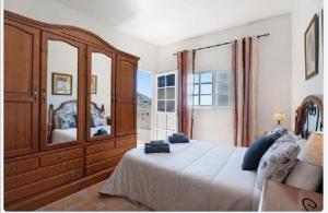 Posteľ alebo postele v izbe v ubytovaní Casa María - Finca Medina
