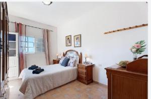 Posteľ alebo postele v izbe v ubytovaní Casa María - Finca Medina