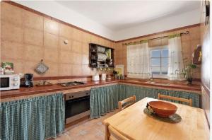 Kuchyňa alebo kuchynka v ubytovaní Casa María - Finca Medina